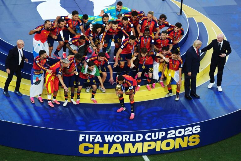 Confused Trump wanders through Spain's World Cup celebration photo