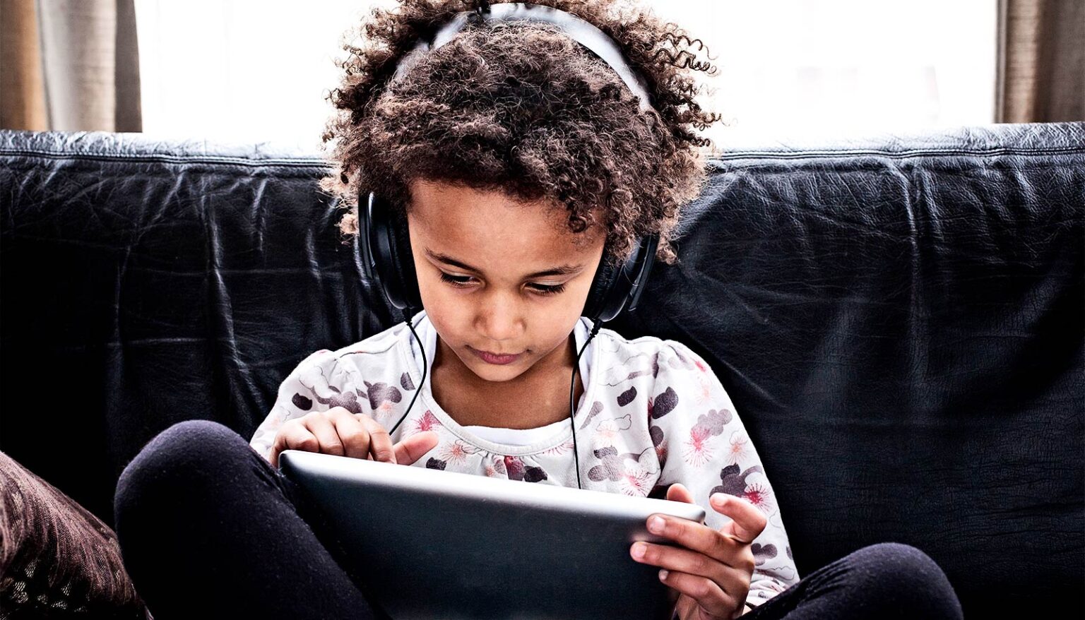 Doctor explains how technology should enhance, not replace parenting during children’s formative years.