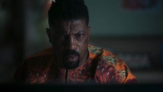‘Average Joe’ Is Back! Deon Cole & Michael Trucco Talk Taking The Chaos International For The Show’s Explosive Second Season [Exclusive]