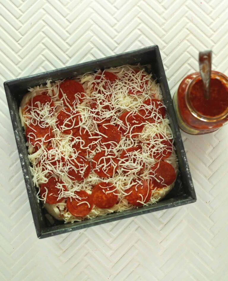 This deep dish pizza recipe is everything I love about pizza with a thick crust.