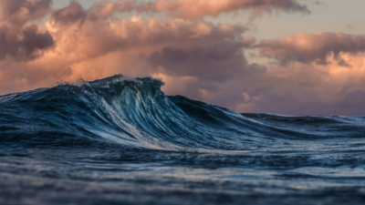Waves Play a Key Role for Lateral Stirring and Mixing of Ocean Tracers